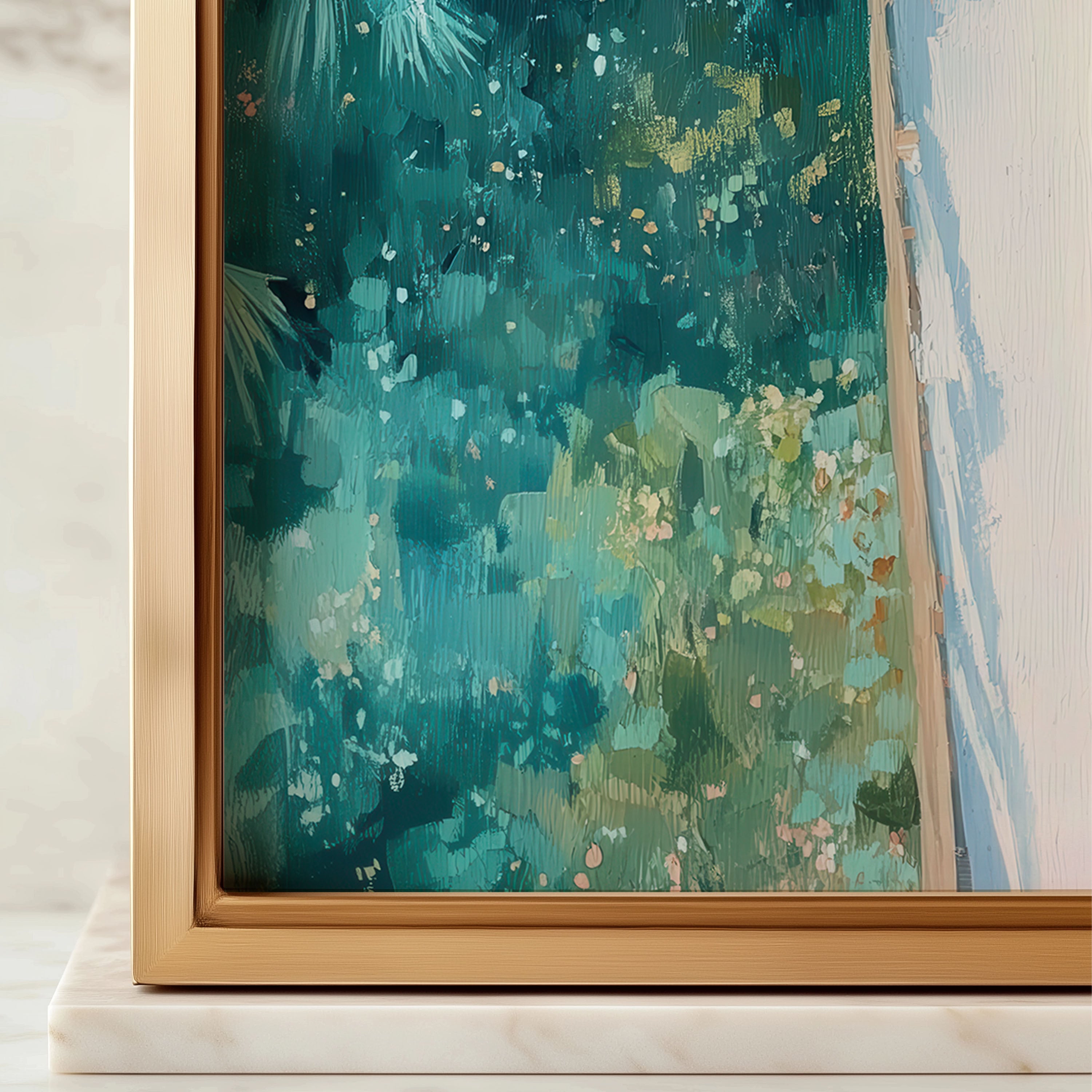 Framed abstract artwork with teal and gold colors on a marble surface